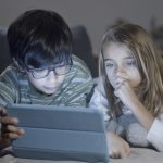 Kids looking at computer - California Family Council