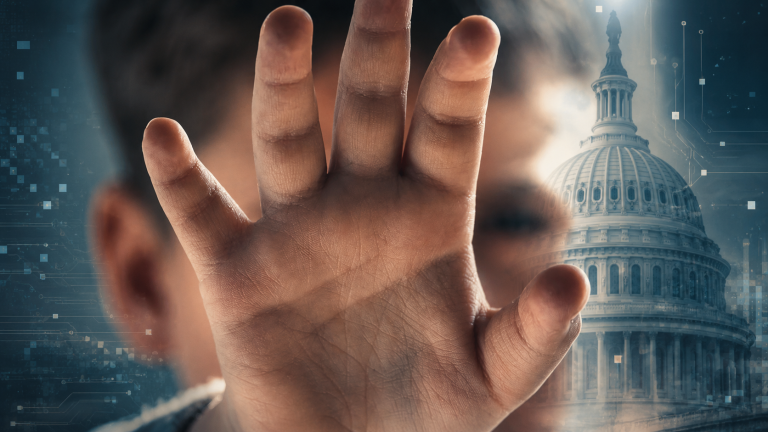 Raised hand in the foreground blocks the view of the U.S. Capitol, with a digital circuit backdrop suggesting technology and control.